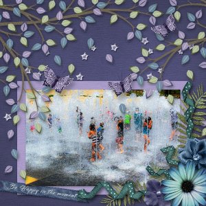 Happiness is...playing in a fountain!