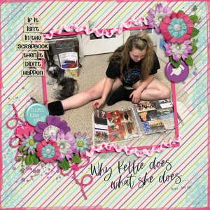 4/20 Abigail looking through scrapbooks