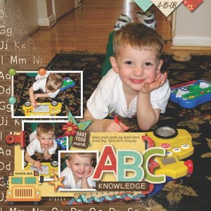 Micah Playing with School Bus Toy