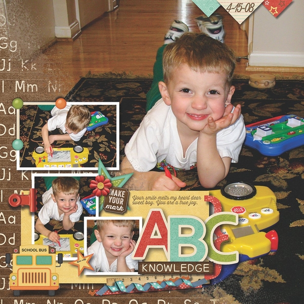 Micah Playing with School Bus Toy
