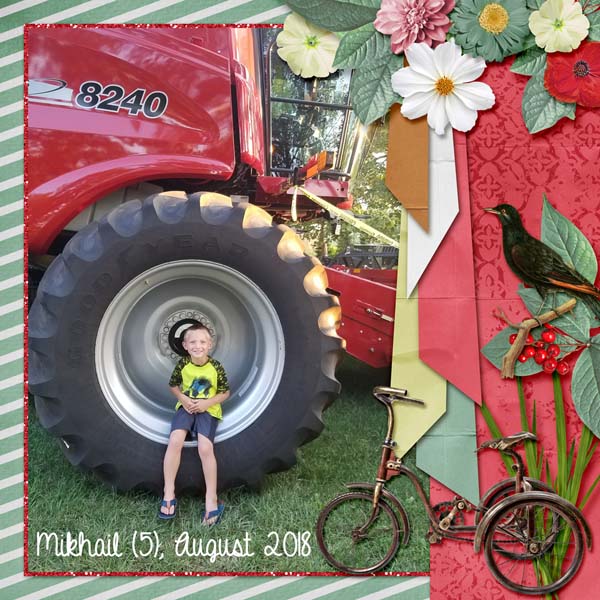 Mikhail on tractor wheel